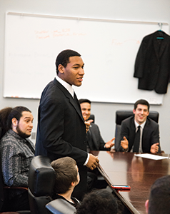 A Brother 2 Brother chapter member speaks to his peers at a meeting to plan outreach programs. (Photo courtesy ABH Studios)