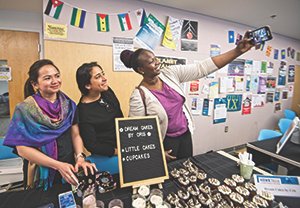 Students sell homemade products and baked goods at HawkTrade, an exhibition of student-run businesses on the AACC campus, in April 2019.