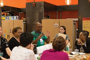 Members of a 100kin10 project team convene at the 2018 annual summit. The organization consists of more than 280 higher education and K-12 institutions, corporations, nonprofits, and government agencies.