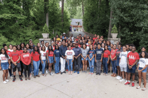 Howard University President Wayne A. I. Frederick (center) poses with the first three cohorts of the Karsh STEM Scholars Program.