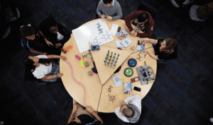 Florida International University’s STEM Transformation Institute has redesigned the classroom experience including the addition of diverse student learning assistants who help guide their peers through difficult course content. 