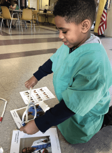a child participates in the This is How We “Role” program at the Purdue University College of Veterinary Medicine