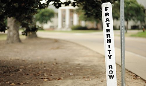 frat Photo of a sign on a college campus that reads Fraternity Row