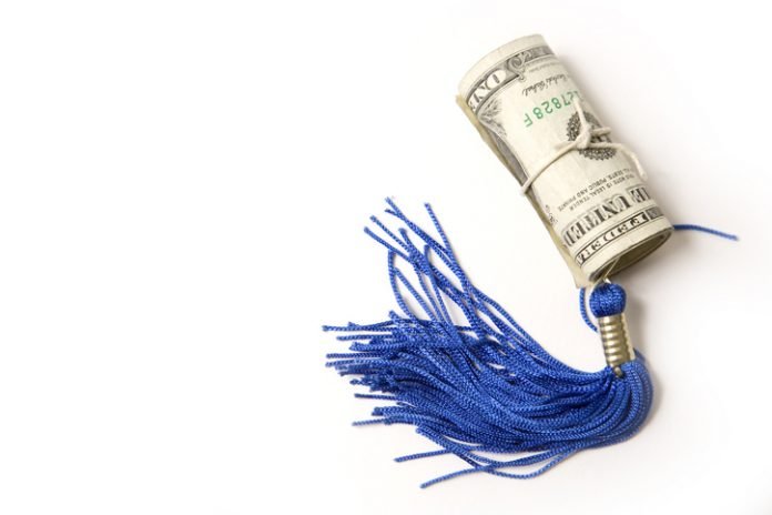 tassel and money Photo of dollar bills wrapped around a graduation tassel