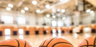 Three basketballs lined up on the bottom of the screen leaving space for copy on the upper portion of the image