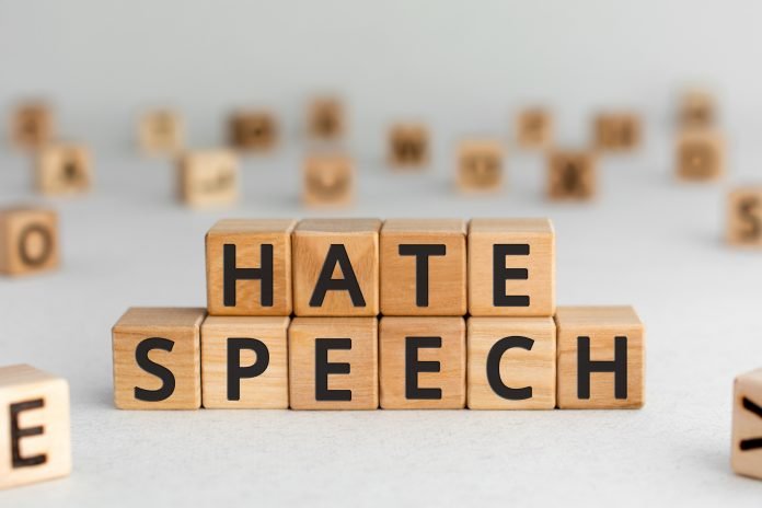 Hate speech - words from wooden blocks with letters