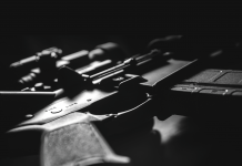 Photo of a handgun in shadows