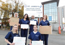 medical students posts with signs about ending climate change
