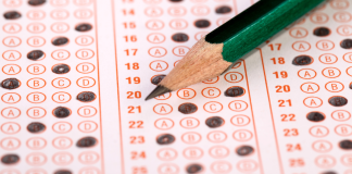 Pencil lying on top of test bubble sheet